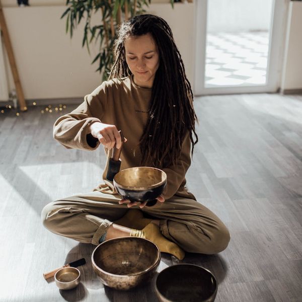 Woman feeling energized and balanced after a yoga session.